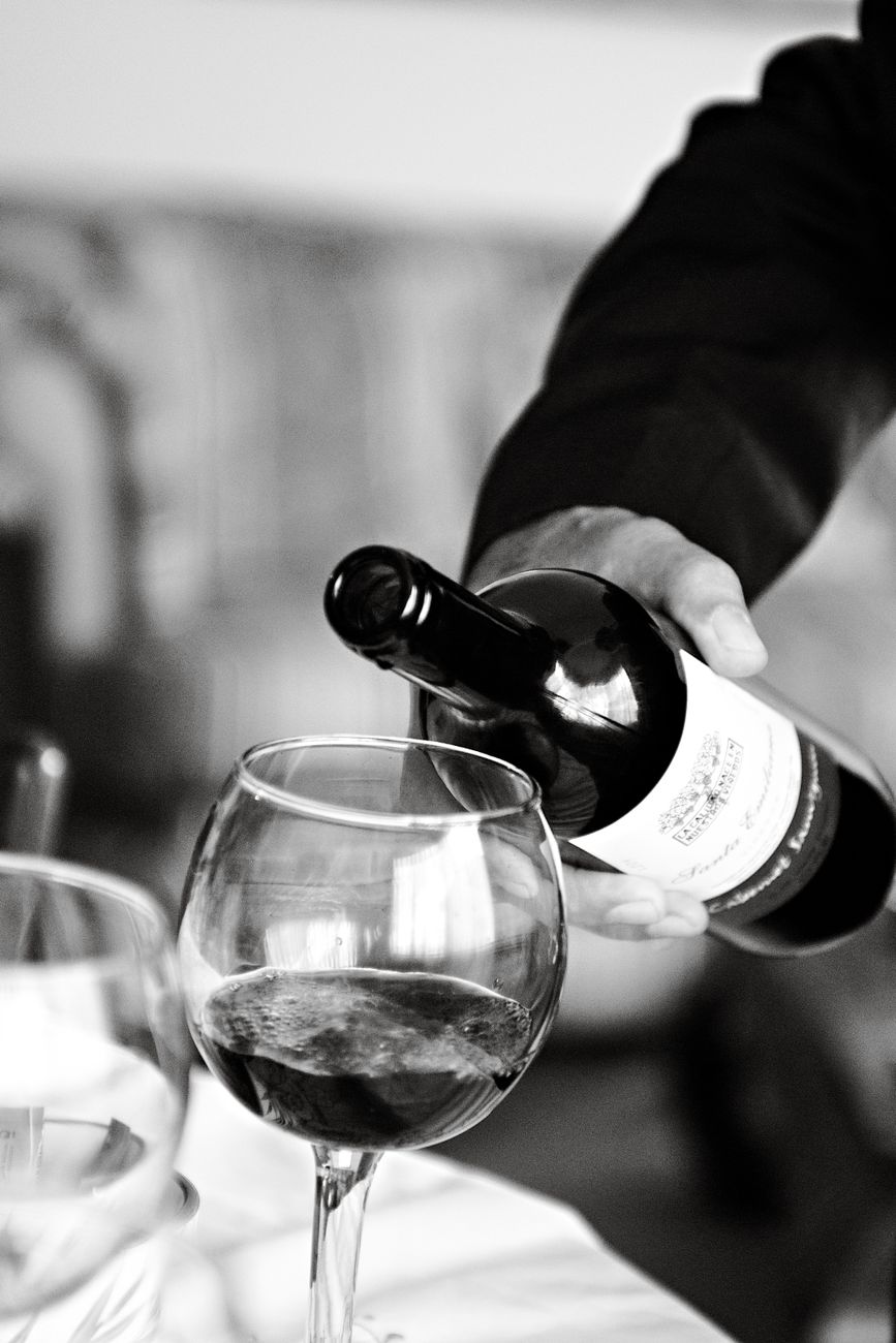 elegant italian wine pouring in black and white